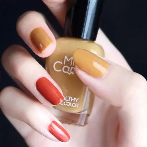 橘色美甲图片,点亮指尖的夏日风情